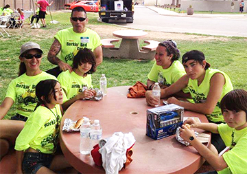 Some of our awesome volunteers (in all sizes) taking a break during our annual Barkin' Bad Carshow