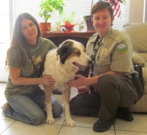 Angela Stell (NMDOG) and Officer Nelson with Ozzy